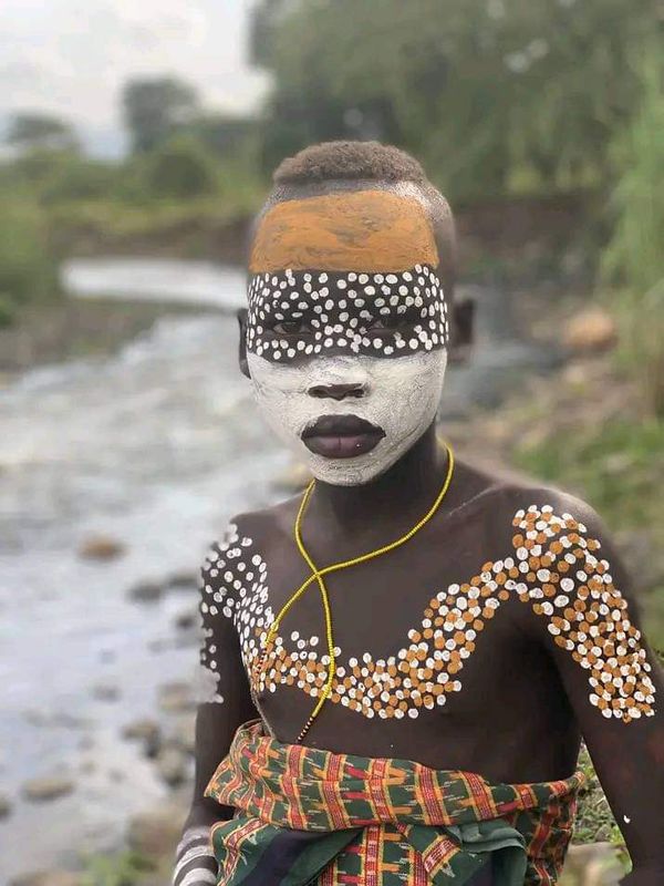 Addis Ababa Private Tour - Body painting of Mursi boy in Omo valley