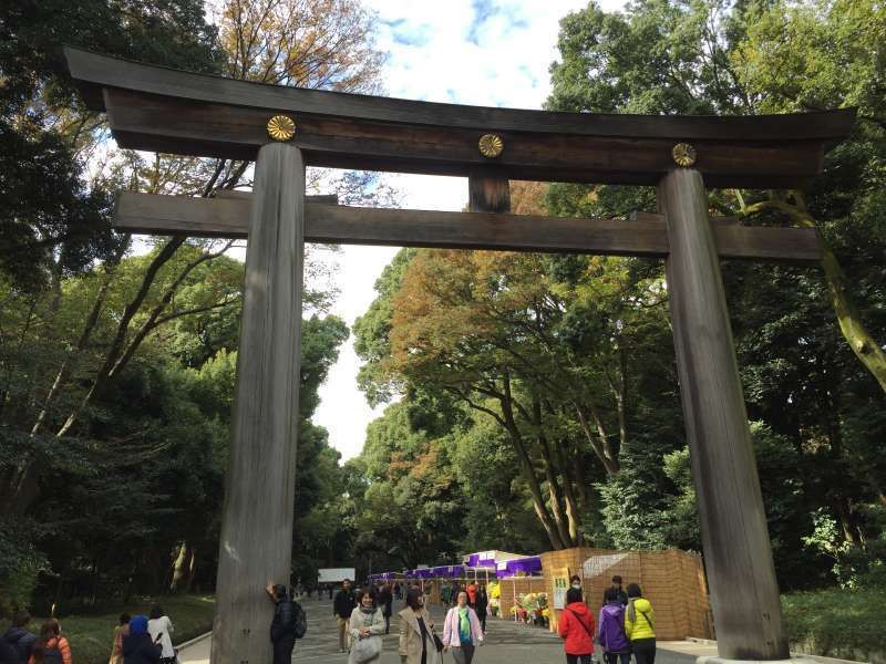 Tokyo Private Tour - This is a great Torii gate of Meiji Shinto shrine enshrined great grand father of the present Emperor of
Japan.