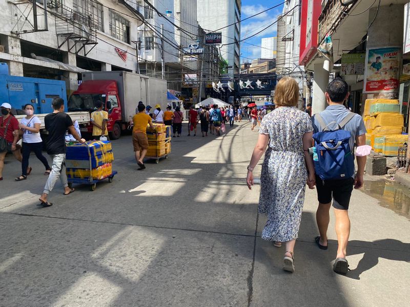 Manila Private Tour - My guests walking along the streets of Manila to experience the street life and the everyday routine of the locals.