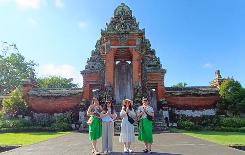 Bali Private Tour - Pose at Main Gate of Taman Ayun Royal Family Temple in Mengwi - Badung