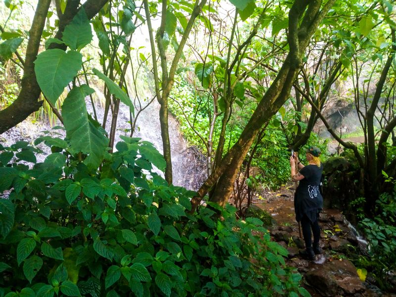 Kampala Private Tour - Tourist at the bottom of Sipi Falls 