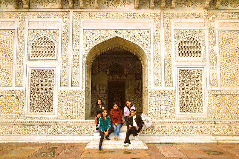 Delhi Private Tour - The Itimad-ud-Daulah Tomb in Agra, often called the "Baby Taj," is a sublime masterpiece of Mughal architecture. This exquisite mausoleum, built of white marble and adorned with intricate inlay work, offers a glimpse into the artistic heritage that influenced the construction of the Taj Mahal. A visit to this smaller, yet equally stunning, tomb is a journey into the elegance and craftsmanship of the Mughal era.