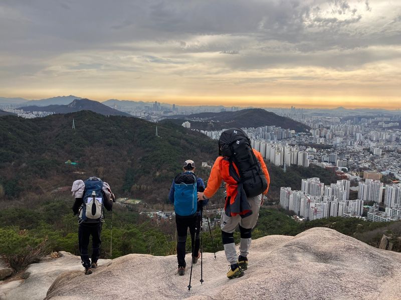 Seoul Private Tour - Descending after trekking in sunset by Hans.