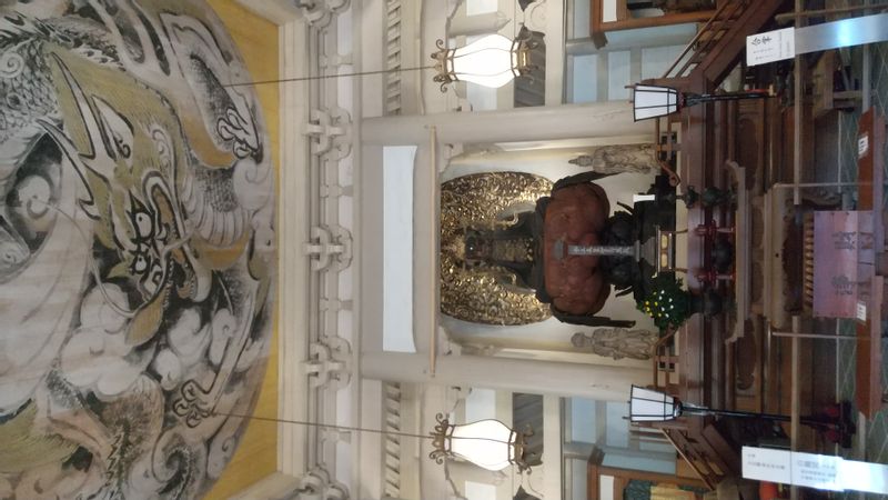 Tokyo Private Tour - Engakuji Temple Butsuden Holy Hall, stunning statue of Buddha and auspicious painting of dragon on the ceiling. 
This temple has a brilliant architecture, Shariden, designated as the national treasure and the Great Bell on the top of hill, also designated as the national treasure. You can view a panoramic view of Mt Fuji from the hill top if the sky is clear.