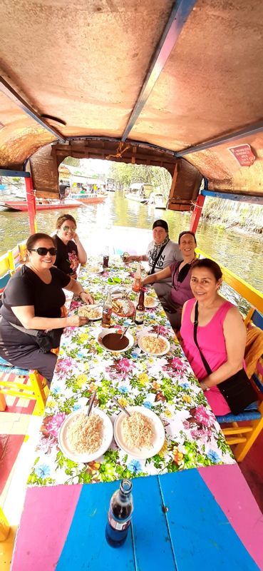 Mexico City Private Tour - Mexican-American friends eating delicious Mexican food.