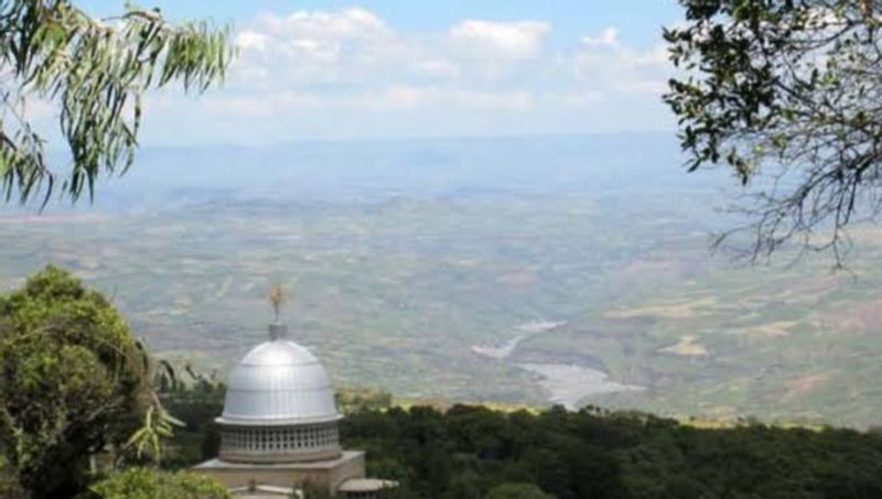 Addis Ababa Private Tour - The Monastery church of Abue Tekelhaimnot in Debere Libanos with the landscape and Portuguese bridge