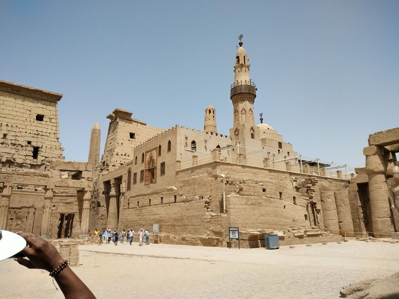 Luxor Private Tour - Three religion symbols in one picture at Luxor temple [Obelisk, Church tower and mosque minaret]