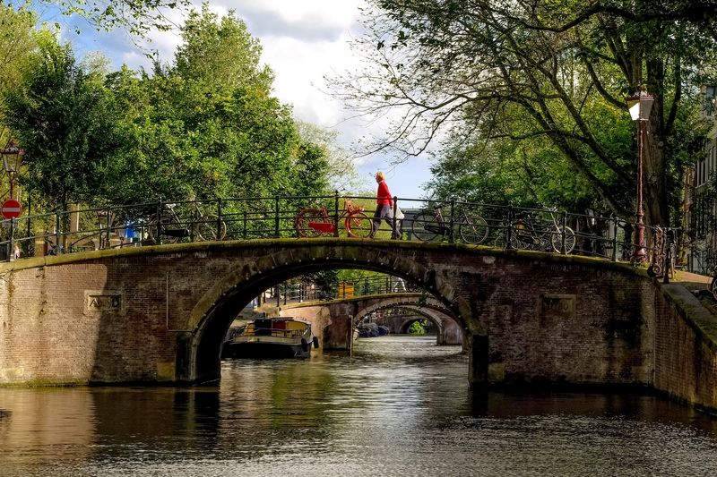 Amsterdam Private Tour - Wander through the enchanting charm of Amsterdam's cozy streets and picturesque canals, where every corner exudes a welcoming atmosphere, inviting you to embrace the city's intimate and timeless beauty.