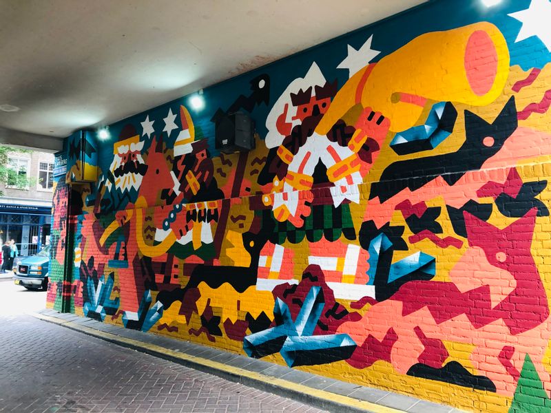 Rotterdam Private Tour - Rotterdam is full of street art. From classic graffiti to street installations, from huge murals to tiny mosaics, Rotterdam has it all. Not only is there room for faceless hooligans, but also "the great and terrible" Picasso.