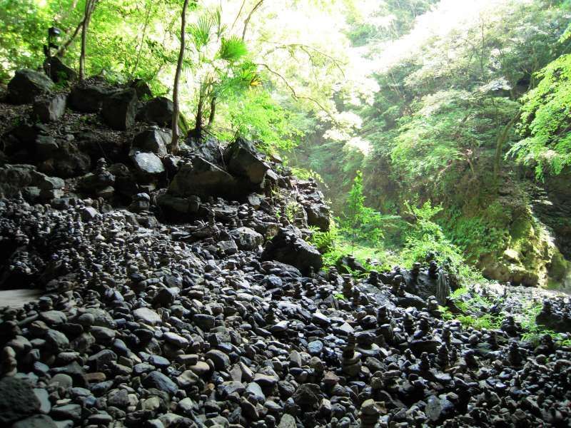 Fukuoka Private Tour - Amanoyasugawara shrine.  You'll be amazed to see those thousands of piles of stones in this place.