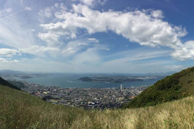 Fukuoka Private Tour - Panorama view from the hill, the vantage point,(1) left side. Dairi district town, in Moji, Kitakyushu city, Fukuoka prefectures is seen. Also, over the small channel, the other side is Shimonoseki city, Yamaguchi prefecture, Honshu island.