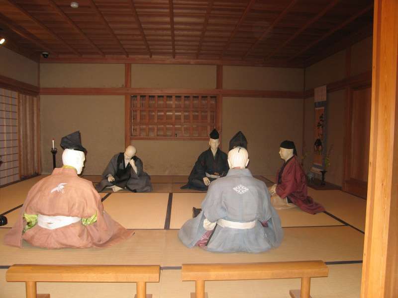 Ehime Private Tour - A house depicting a samurai residence in the 16th century. People are enjoying composing "renga" ,or linked verse, from which haiku poetry came. What samura did in those days was not  limited in martial arts. Many were good at literature. This is located near Shiki Memorial Museum.