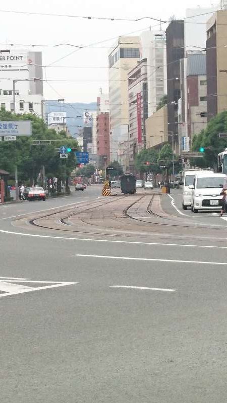 Ehime Private Tour - The Ichiban-sho street, along which the central and prefectural government offices are located. Trams run along the street.