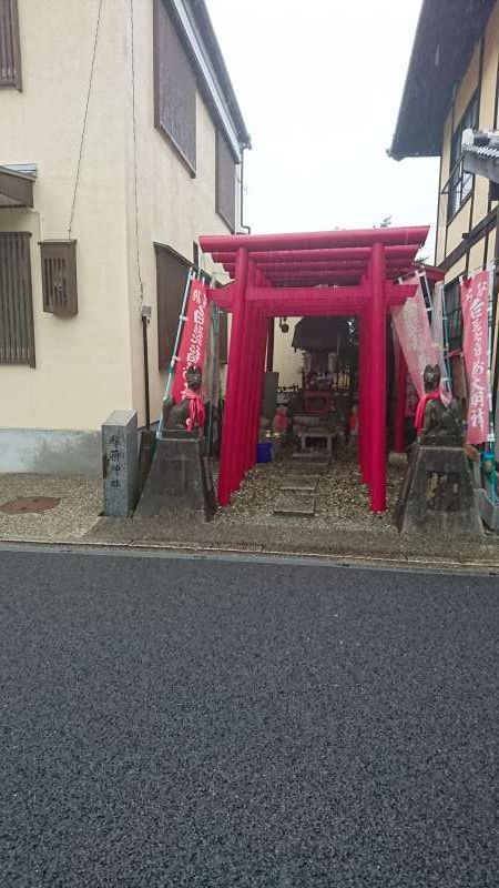 Ehime Private Tour - This is a Inari-jinja shrine. It is a local tutelary Shinto shrine dedicated to the deity of harvest and industry. The shrines of this category could be found at many places across Japan. The feature is that the torii is painted red and there are a pair of fox statues. Foxes are believed to be messengers of the deity. So people love them.