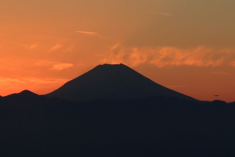 Tokyo Private Tour - View of Mt. Fuji at sunset from the 202m tall Tokyo Metro Government Bldg observation deck.
