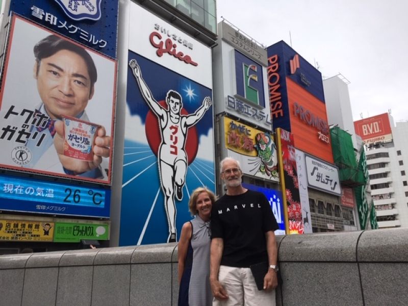 Osaka Private Tour - Nice couple and Running Man, famous Guriko Poster, at Dotombori Downtown Osaka