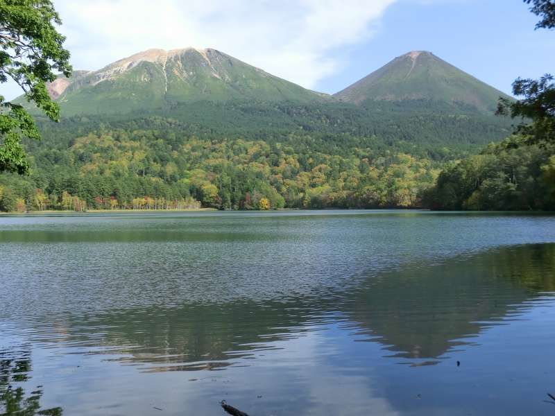 Shiretoko / Abashiri Private Tour - Two mountains, Mt. Meakan (left) and Mt. Akan-fuji (right) are so beautiful to be reflected on the water of Lake Onneto.