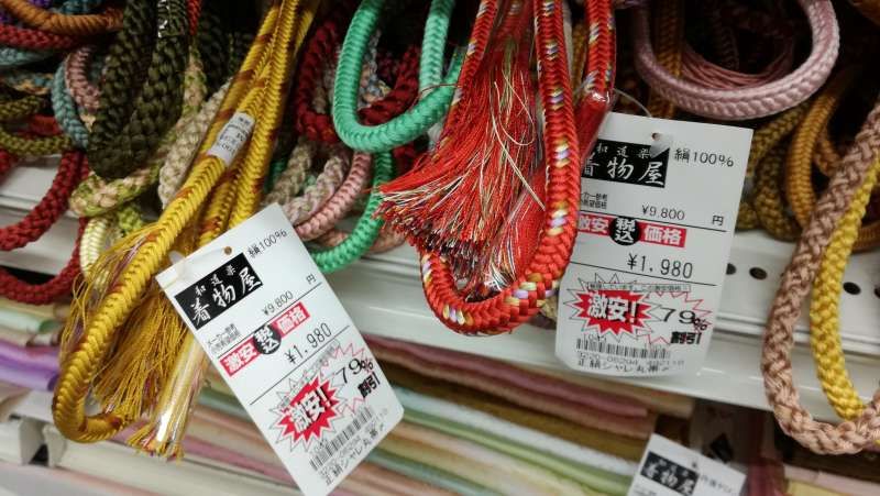 Aichi Private Tour - Inside of kimono discount shop. This is OBIJIME belt, kimono accessories.