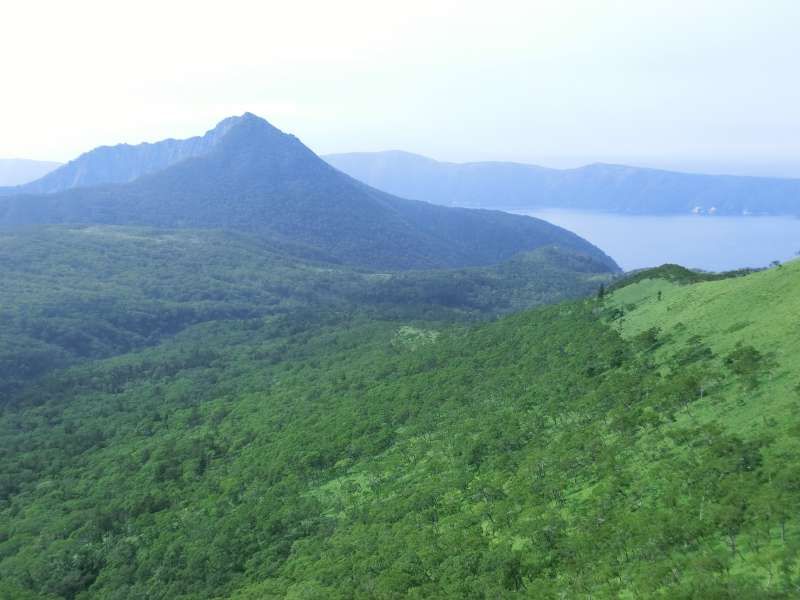 Shiretoko / Abashiri Private Tour - On the way to the top of Mt. Nishibetsu, there is a small peak called "Risuke Yama" or Mt. Risuke. It is named after a man who made this mountain trail many years ago.