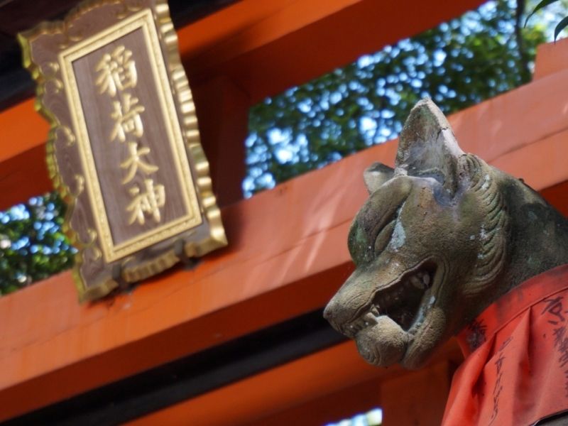 Kyoto Private Tour - Stone statue of fox, a messenger of the diety is guarding the shrine