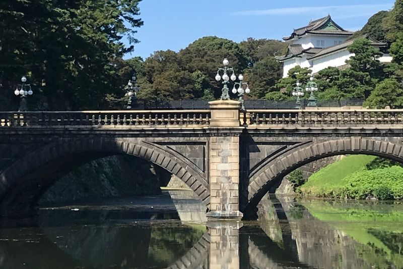 Tokyo Private Tour - A moat in the Imperial Palace grounds, where the Emperor lives. In the background is one of the watchtowers. (#5)