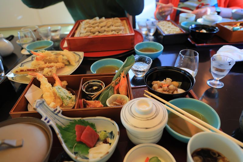 Niigata Private Tour - After the brewery visit, it is time to enjoy mini Kaiseki dishes or Soba noodel with tempra. The best quality pure rice Junmai Daiginjo sake goes very well with these local dishes.