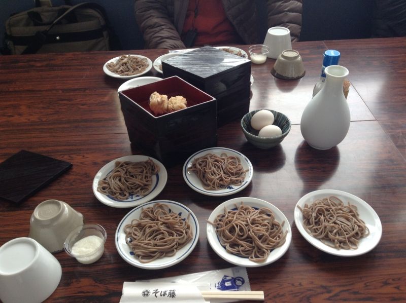 Hyogo Private Tour - This picture shows "Izushi soba(buckwheat) noodle" which is served with small dishes.It is different from soba in another place. And The white dish is "Izushi-yaki" pottery.