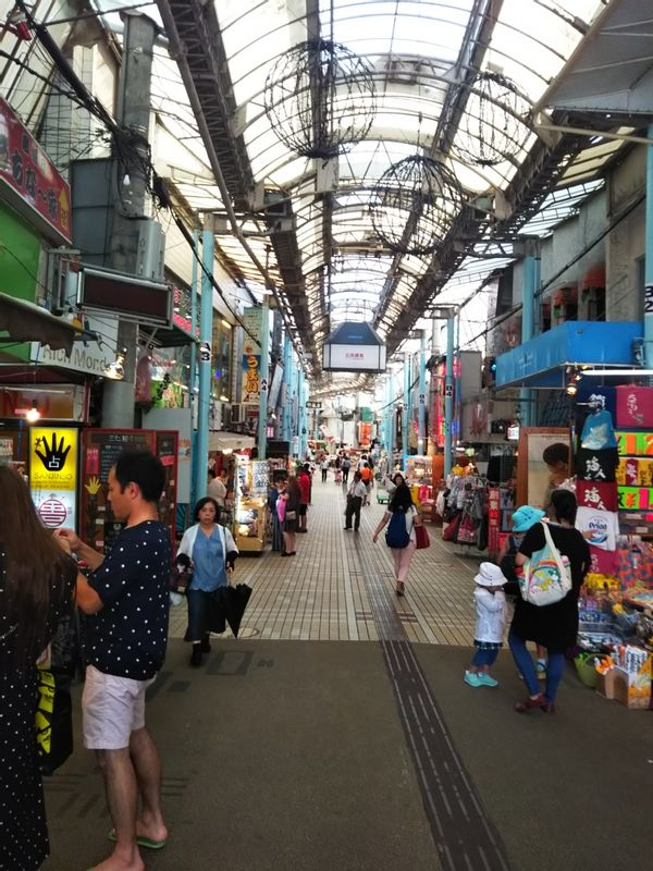 Okinawa Main Island Private Tour - This is near Makishi market, there are abundant shops along to narrow street. Makishi  market is public market for fresh groceries. If you would like to taste sasimi, raw fish, you can buy fish and eat it at the upstairs restaurant. They will cook for you.