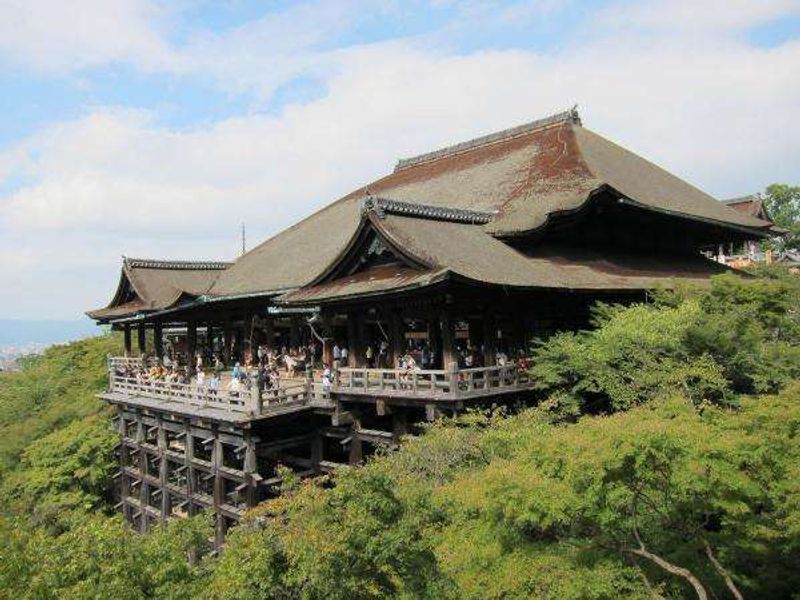 Kyoto Private Tour - ・Kiyomizu Temple
       There is a big stage which is 12 m (39 ft.) high. It is equivalent to a four-storied building.
       In the middle ages, people believed that when they jumped off this stage and survived while praying, their wish would 
       come true. Actually, 234 people jumped off and 85 % survived.