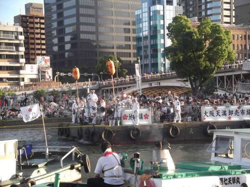 Osaka Private Tour - Raft with festival organizers on board.