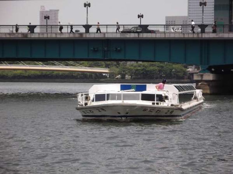 Osaka Private Tour - "Osaka water bus" approaching the pier.