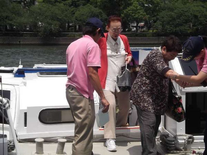 Osaka Private Tour - Passengers getting off "Osaka water bus".