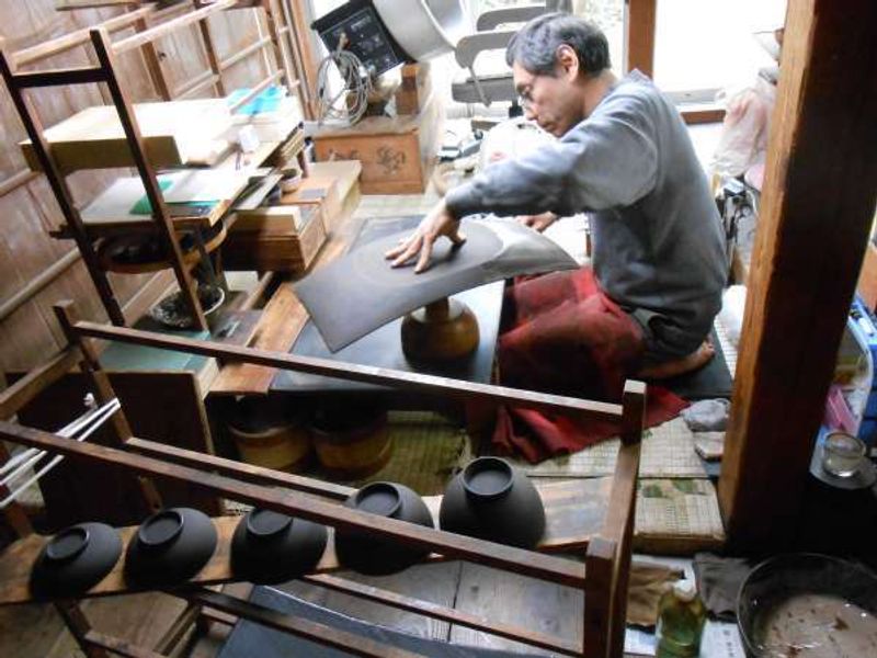 Ishikawa Private Tour - an artisan at Wajima lacquerware workshop of Yamazaki.