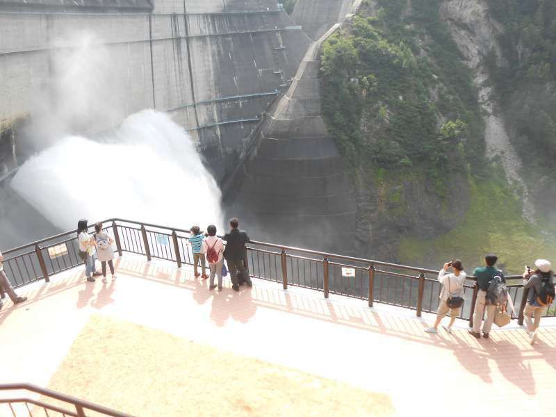 Ishikawa Private Tour - Water is gushing out from Kurobe Dam.