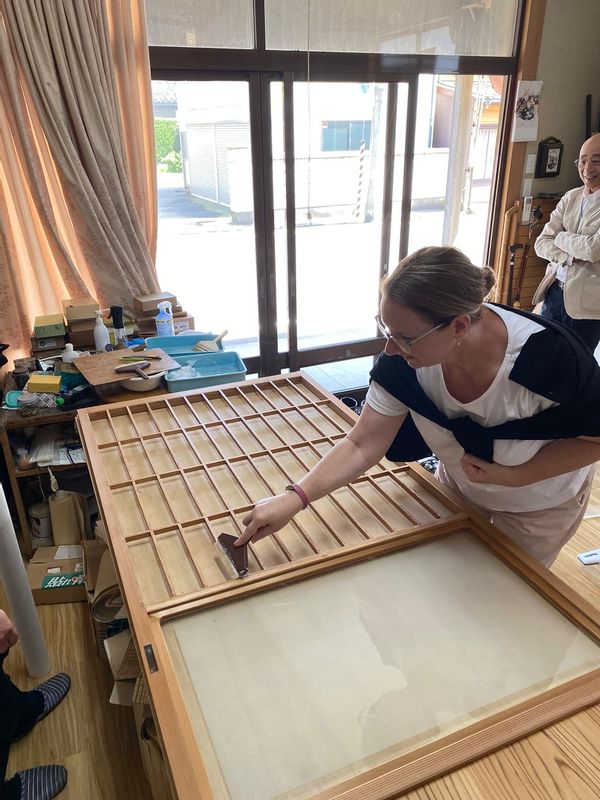 Niigata Private Tour - Putting the glue on the wooden frame of a paper sliding door: an experience of Japanese culture