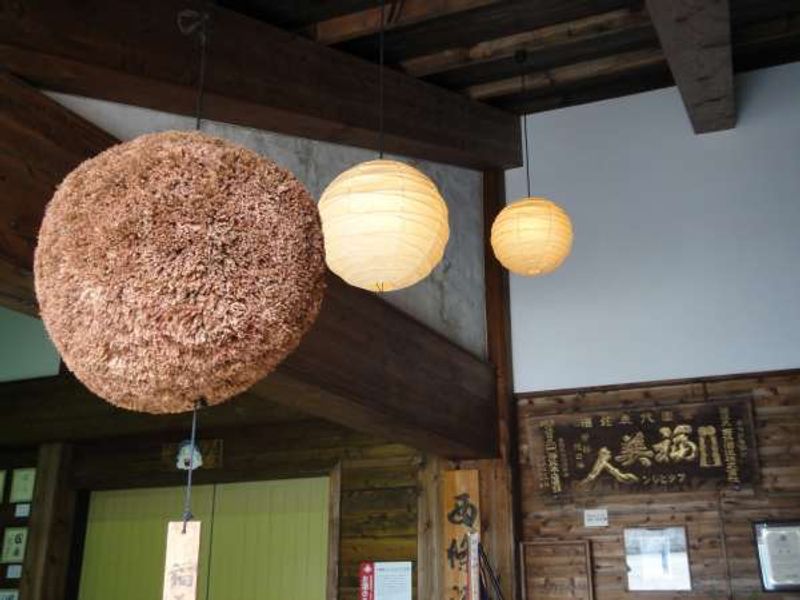 Hiroshima Private Tour - Just like a trip back to old and good days.
"Sugidama" or a large ornamental ball made with cider leaves is hung at the entrance of each sake maker. When new sake has been made, It will be replaced with a fresh green ball to make people aware of it.