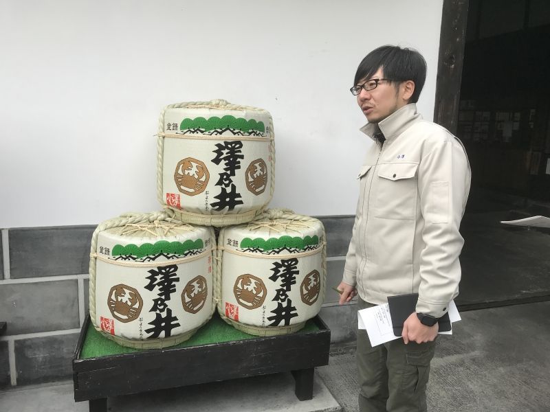 Tokyo Private Tour - Young president of the brewery,  Ozawa-san, and sake casks