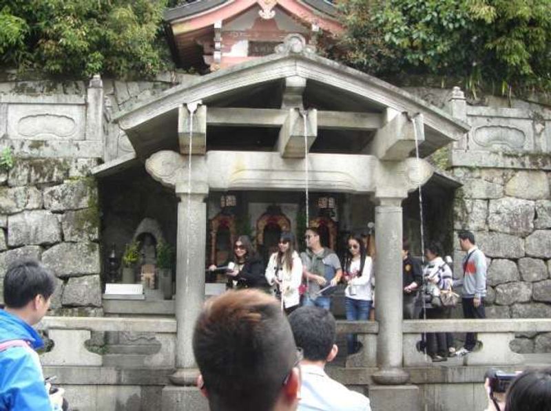 Kyoto Private Tour - Many visitors line up to drink sacred pure water for expecting some divine blessing.