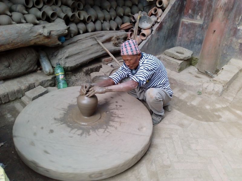 Kathmandu Private Tour - A potter at work in Bhaktapur.