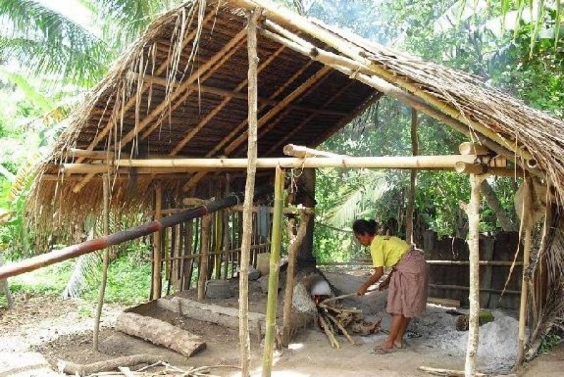 East Nusa Tenggara Private Tour - Distillation process in the hut.