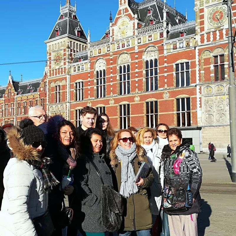 Amsterdam Private Tour - Group in front of the central station of Amsterdam ..