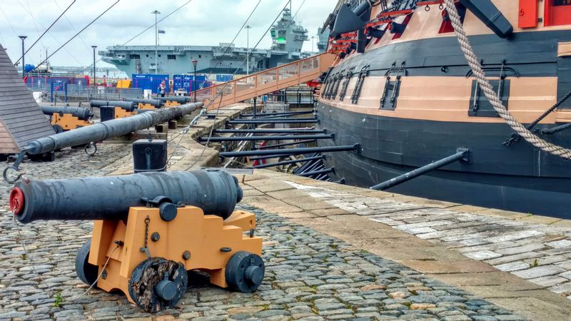 Portsmouth Private Tour - HMS Victory with HMS Queen Elizabeth in the background. 