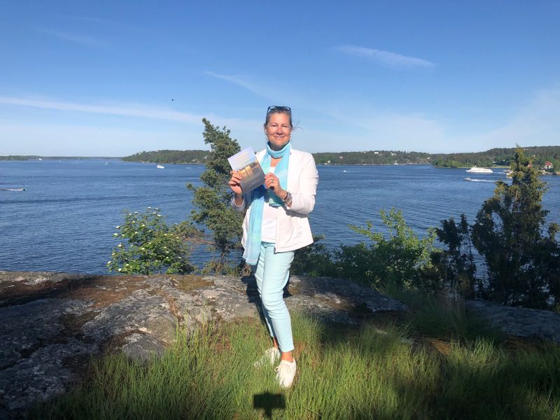 Stockholm Private Tour - Your Guide Jessica with her newly published book "Stockholm Sweden, At Your Fingertips"