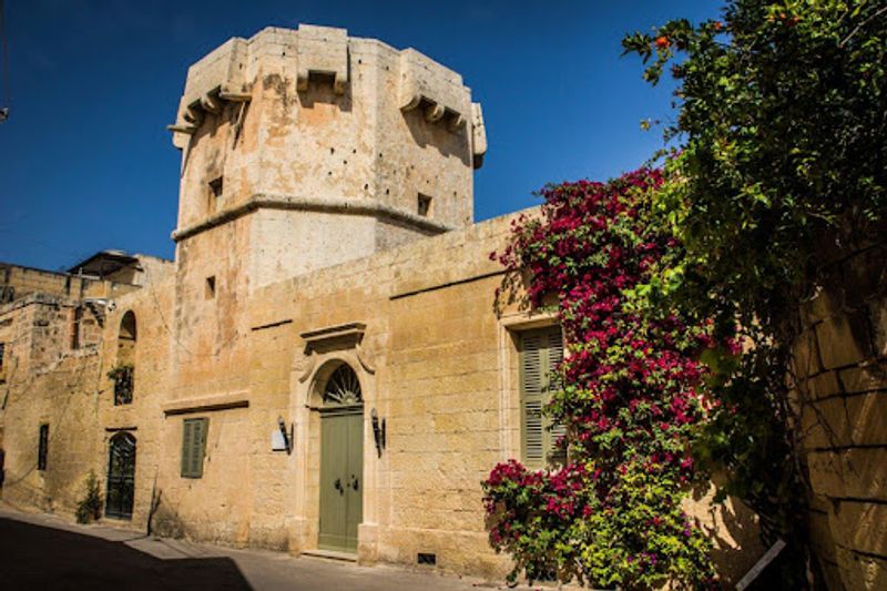 Malta Private Tour - The village of Qrendi was prone to attacks from the sea, and raids by the Ottomans or Barbary corsairs were common up to the early 17th century.  Here is an Octagonal Tower which is one of its kind in Malta. It is called Torre Cavalier (Knight's Tower) and among the locals it is known as 'It-Torri tal-Mishun' in English (Tower of boiling water).  