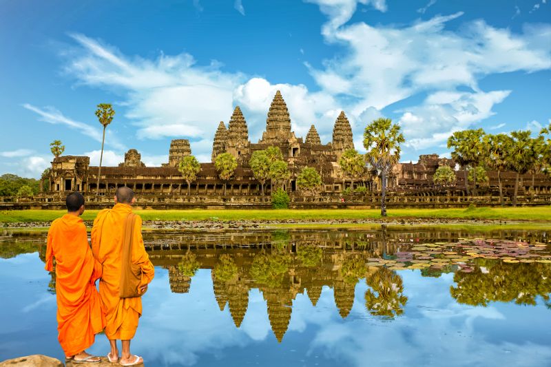 Siem Reap Private Tour - Monk at Angkor Wat Temple after sunrise, Siem Reap, Cambodia.