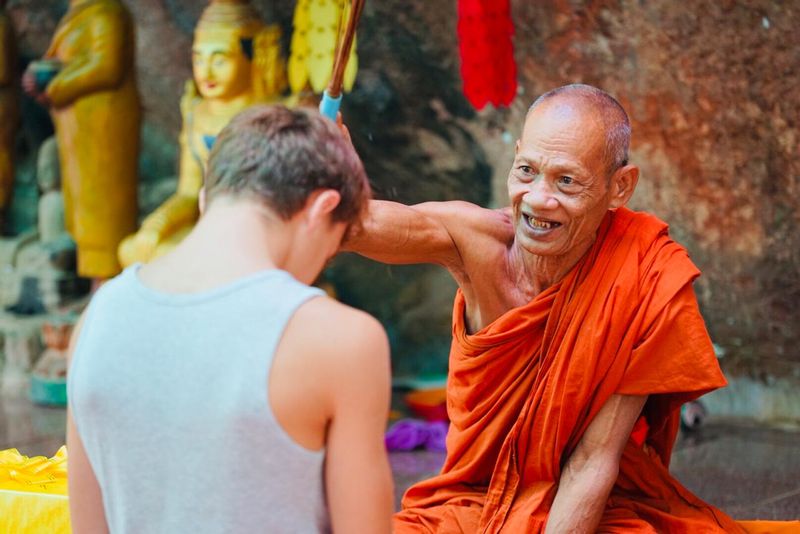 Siem Reap Private Tour - Monk blessing on the mountain