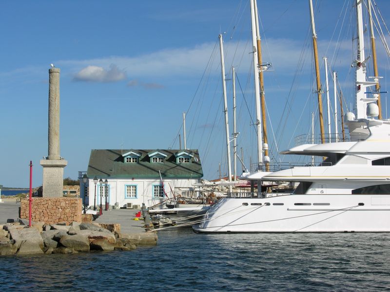 Olbia Private Tour - The column on the left is a true Roman column. The yachts club