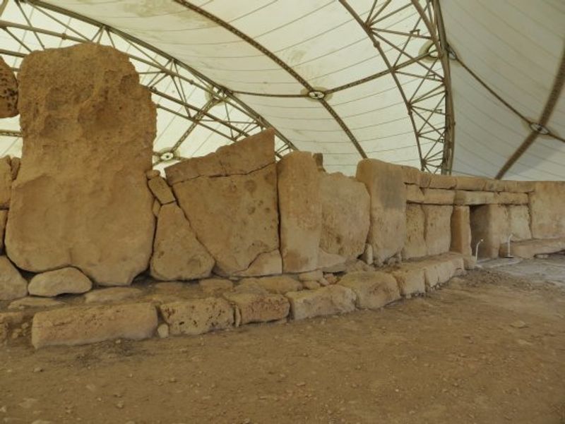 Malta Private Tour - Hagar Qim Temple is one of number of Icons we have on our archipelago. The temple itself has various important spots and one of them is the Summer Solstice from the side of it. On this site number of fat human stone statues were found during its excavation in 1839. It is worth visiting for its construction by unknown builders and no history evidence revealed.   