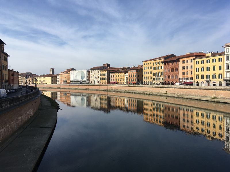 Pisa Private Tour - The center of Pisa as seen from the Middle Bridge over the river Arno. 