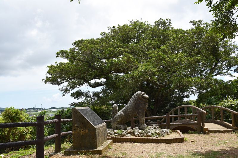 Okinawa Main Island Private Tour - The stone lion still exists in the same place. It has a lot of bullet marks.